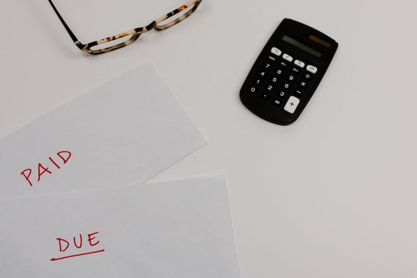 calculator beside energy bill